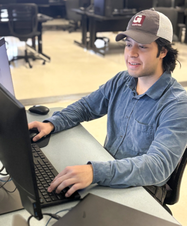 IMG_9598-1 William Justice Almeida, a Drafting and Design student at Texas State Technical College’s Harlingen campus, completes an assignment during a lab session. Almeida also serves as an intern at Garver USA in Harlingen.