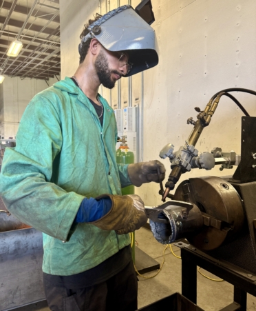 Sergio Hernandez - Welding Sergio Hernandez, a Welding student at Texas State Technical College’s North Texas campus, works for Hughes Tank Company in Venus as a welder, and plans to own his own business in the future. (Photo courtesy of TSTC.)