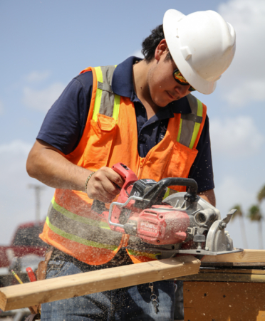 2R7A3227-2 Humberto Martinez, a Building Construction student at Texas State Technical College’s Harlingen campus, cuts wood during a recent lab session.