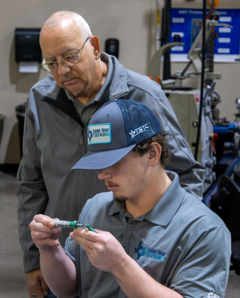 TXFAME student learning hands-on skills in the lab in New Braunfels